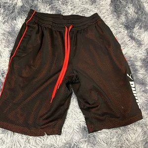 Men’s red and black M Puma shorts